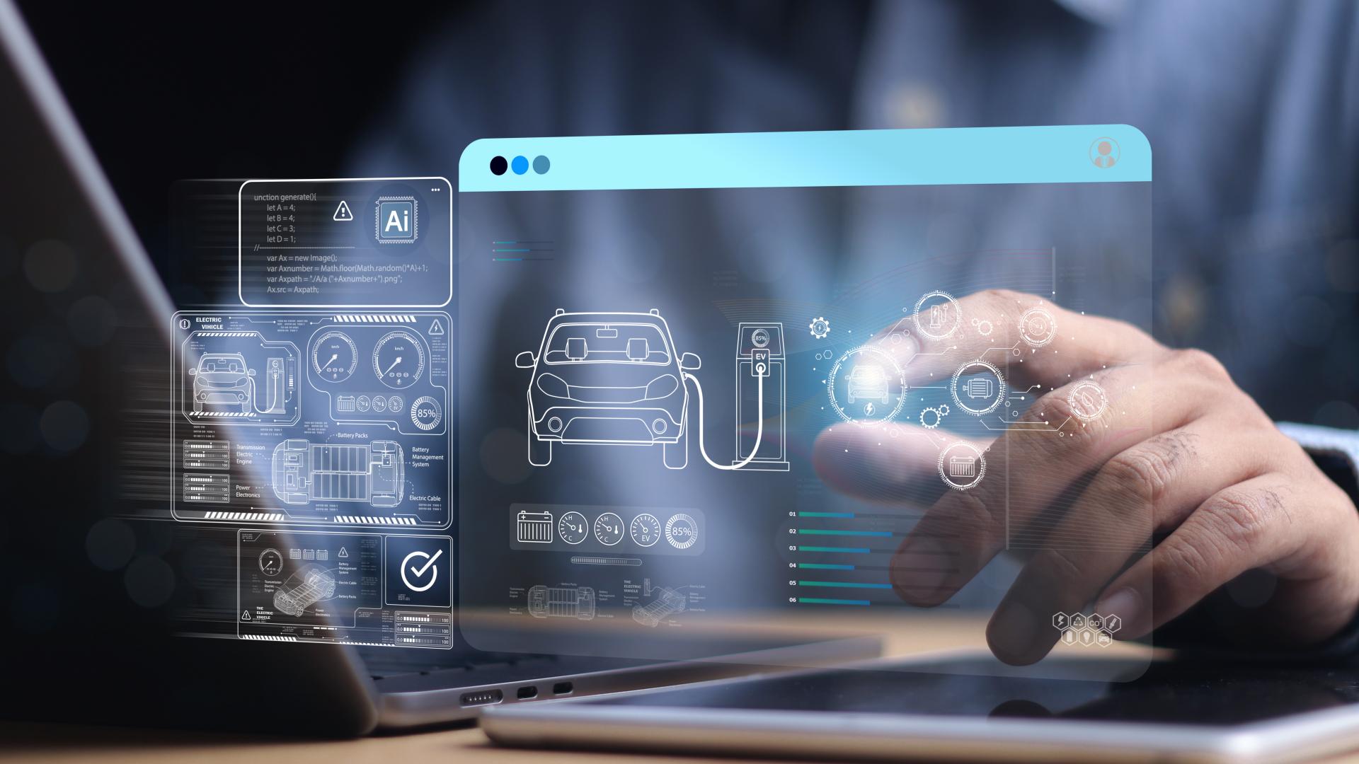 Smarter Software Hologram Automotive | © Adobe Stock 968612603 Person sitzt an einem Schreibtisch mit Laptop und tippt auf ein projiziertes Hologram